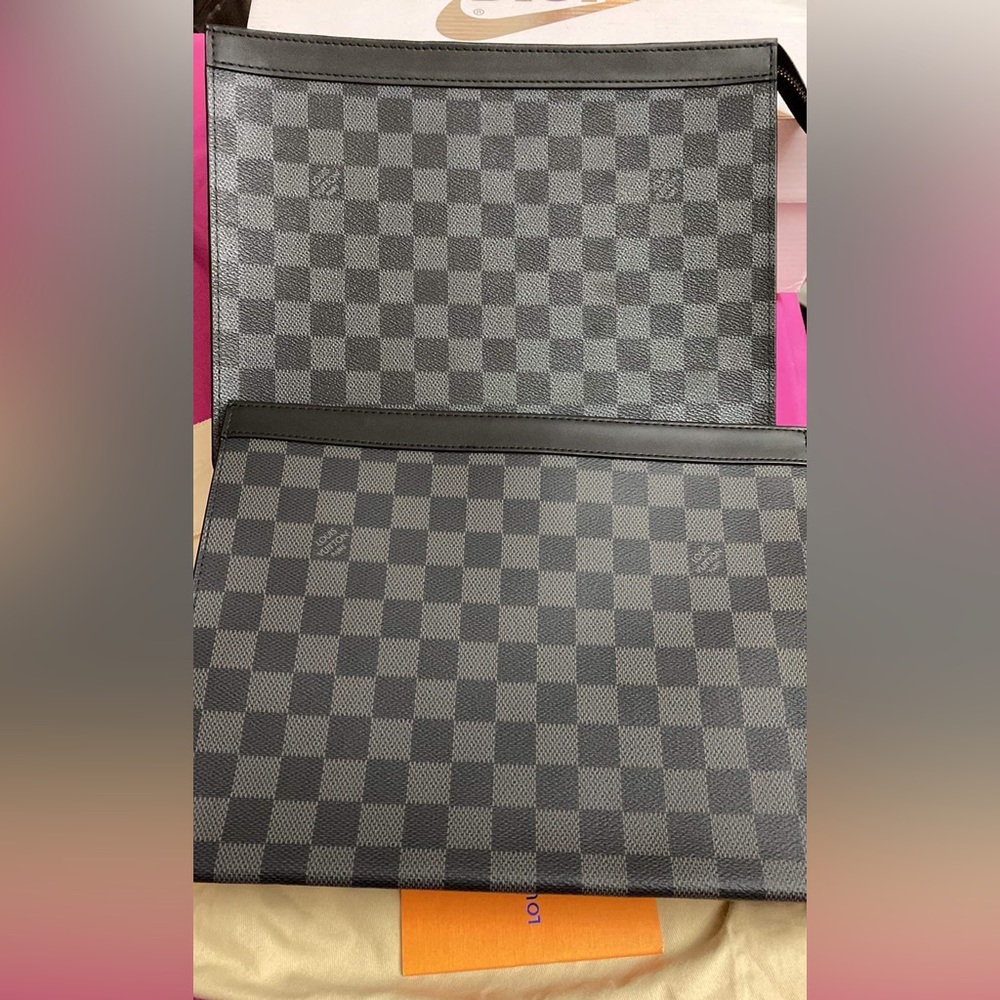 Clutch for men. PRICE REFLECTS